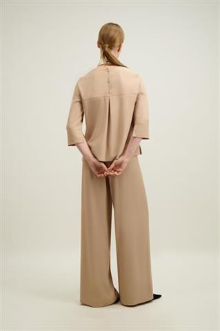 Beżowe szerokie spodnie damskie 57798 - 664951