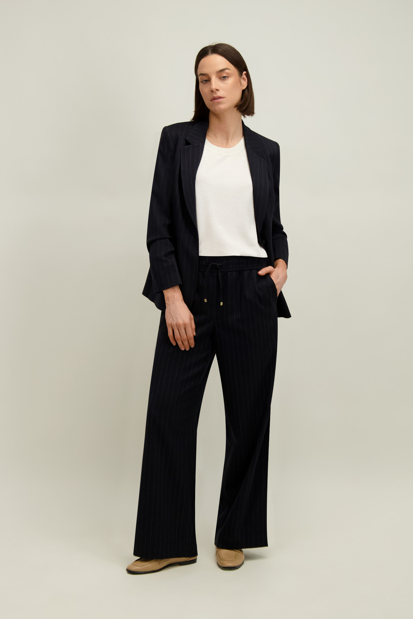 Granatowo-beżowe spodnie damskie 87653